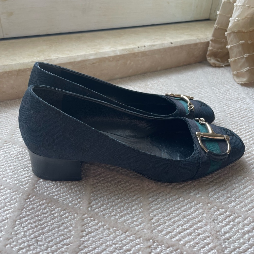 Gucci monogram horsebit slip on